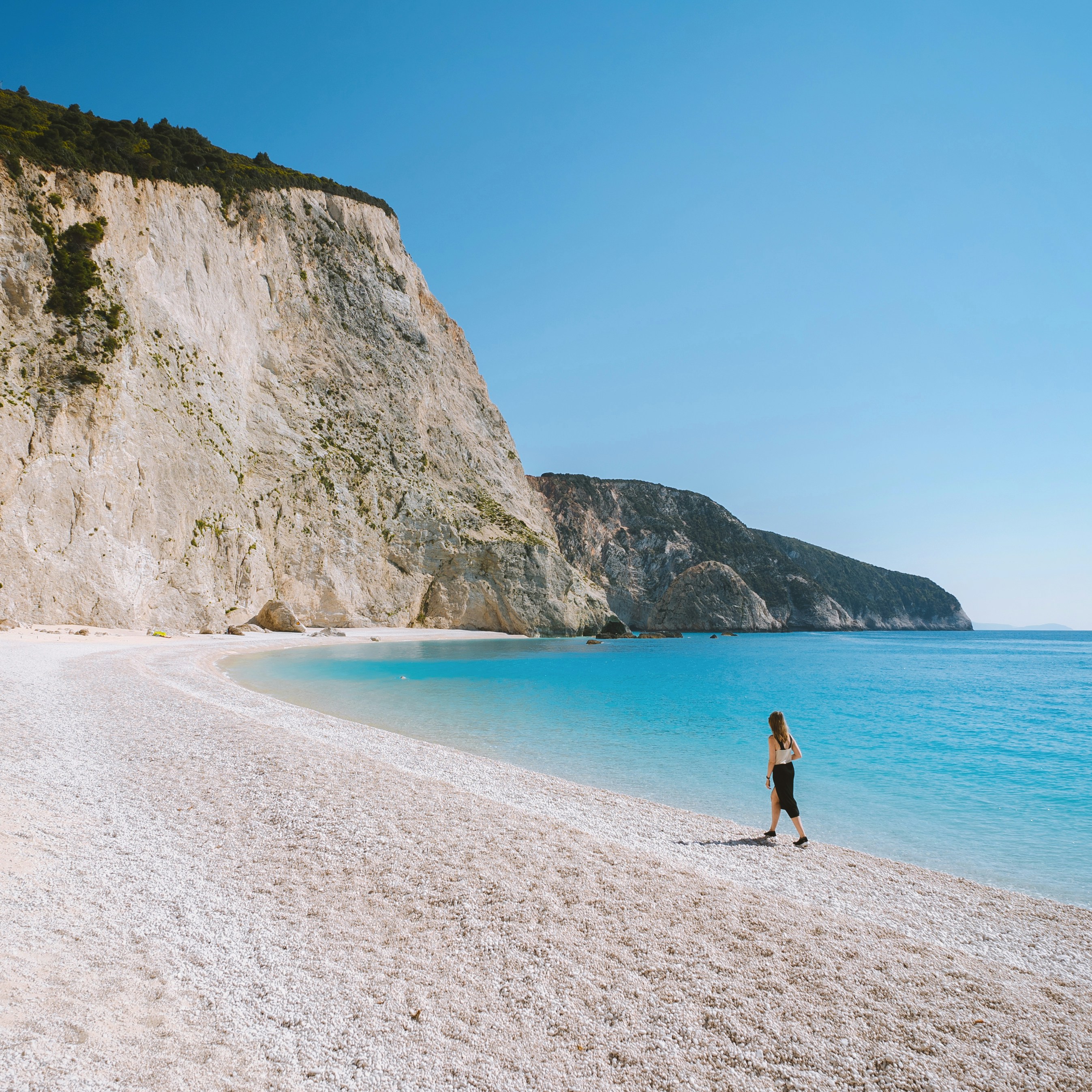 Beach umbrellas and turquoise sea at Kathisma beach, Lefkada west coast